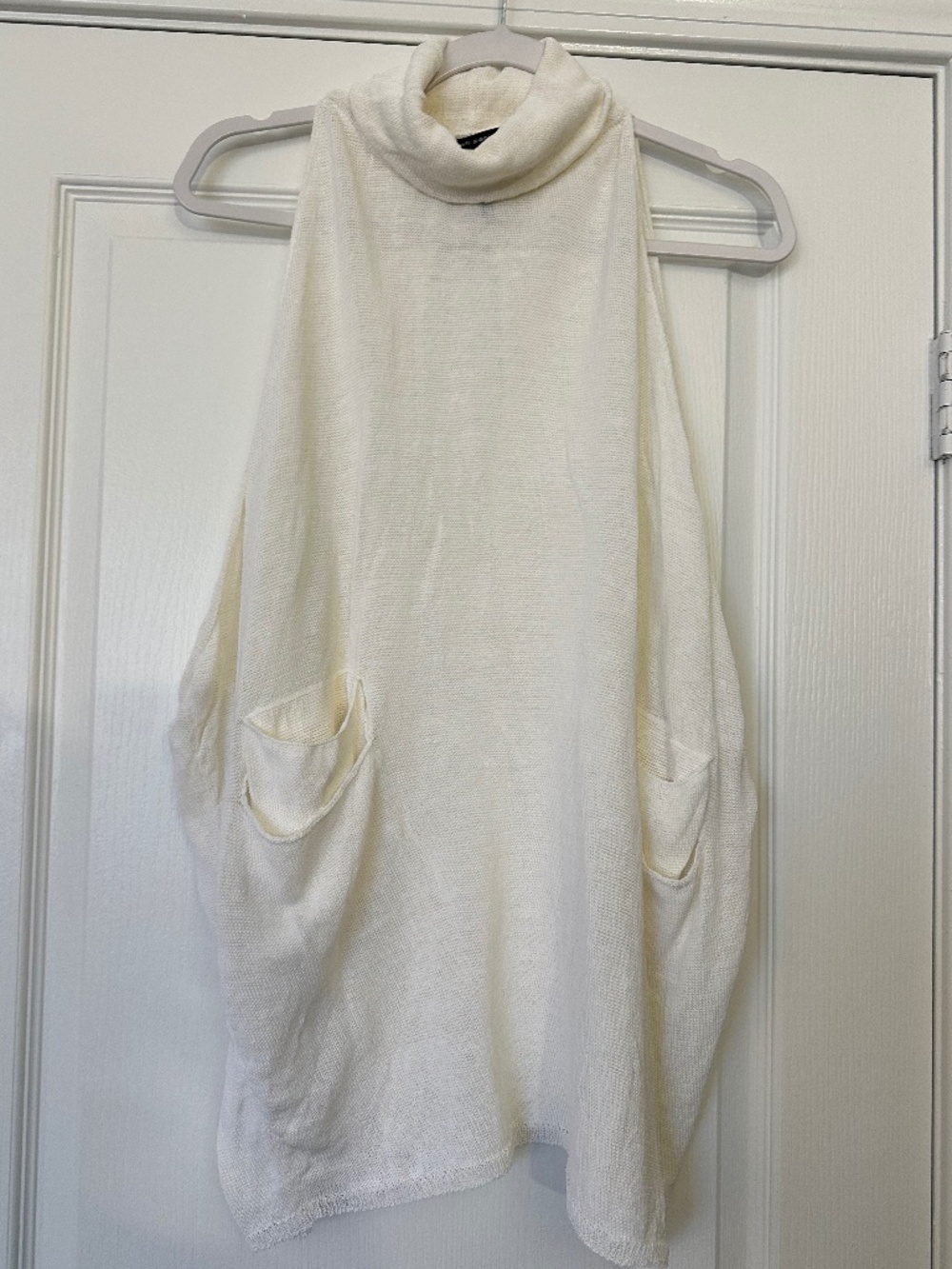 White sleeveless turtleneck knit top with pockets linen blend by Sarah Pacini